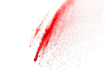 Red powder explosion on white background. Colored cloud. Colorful dust explode. Paint Holi.