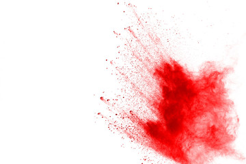 Red powder explosion on white background. Colored cloud. Colorful dust explode. Paint Holi.