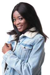 Fashion shoot of afro-american model wearing jeans jacket and burgundy golf.