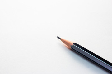 Pencil isolated over white page in a notebook