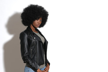 High fashion afro-american model in black leather jacket.
