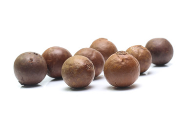 macadamia nuts on white background