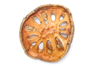 Dry bael fruit on white background