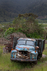 Junkyard. Oldtimer cars. Buller river Highway 6 New Zealand. Carwreck. Rusty
