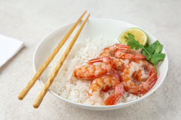 Prawn and rice on white bowl