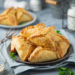 Fresh baked homemade pasties with meat and vegetables