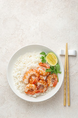 Prawn and rice on white bowl