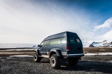Holiday in Iceland:Exploring the island in 4x4 blue monster van near Jokulsarlon in Breidamerkursandur,  Austurland region.Discovering the world. © Bruno_Almela