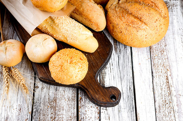 Assortment of baked goods on old white wooden table