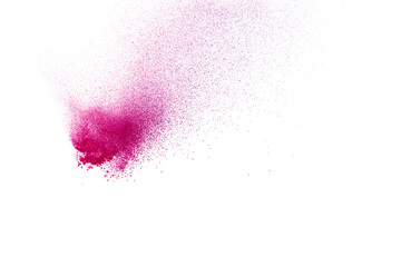 Fototapeta na wymiar Freeze motion of purple color powder exploding on white background.
