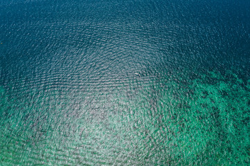 Aerial drone photo of iconic tropical turquoise water Pileh Lagoon surrounded by limestone cliffs,...
