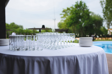empty glasses on table at yard
