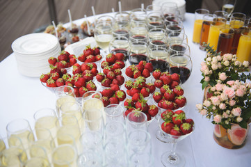 glasses with strawberry and champagne