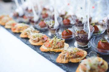row of sandwiches with eggplant hummus