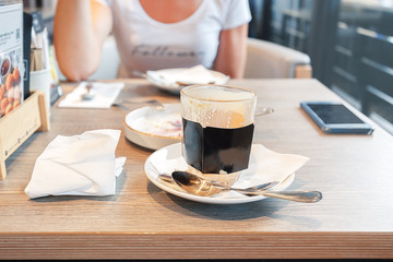 Woman friends drinking coffee in the cafe.