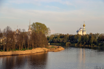 Fototapeta premium Vologda. Beautiful spring evening on the Vologda river Bank. Church Of The Meeting Of The Lord. 18th century; St. Sophia Cathedral