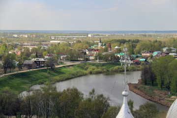 Fototapeta na wymiar Vologda. The view from the top. Sunny spring day. Crosses of the domes of St. Sophia Cathedral