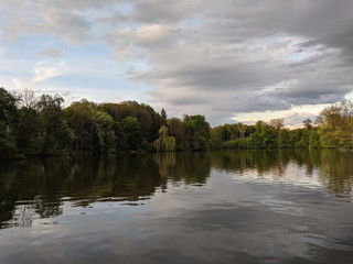 beautiful lake in a village near a pine forest
