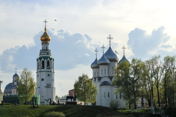 Fototapeta na wymiar Vologda. Beautiful spring evening on the Vologda river Bank. Church Of The Meeting Of The Lord. 18th century.