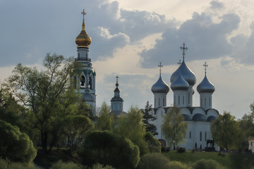 Fototapeta na wymiar Vologda. Beautiful spring evening on the Vologda river Bank. Church Of The Meeting Of The Lord. 18th century.