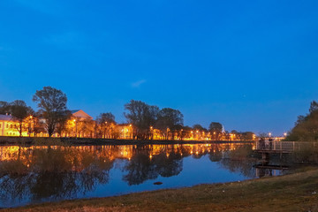 Fototapeta premium Spring in Vologda. Night scene. Church Of St. John Chrysostom. Reflection i
