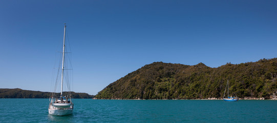 Sailing at Abel Tasman national Park. Coast New Zealand. At sea sailing