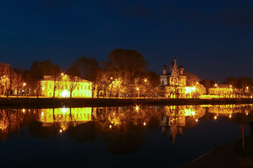 Fototapeta na wymiar Spring in Vologda. Night scene. Church Of St. John Chrysostom. Reflection i