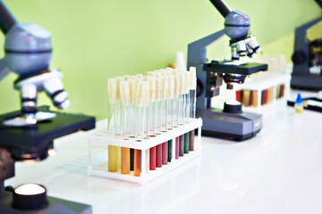 Medical microscopes and samples of biofluids in tubes