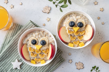 Funny kids breakfast porridge look like cute owls