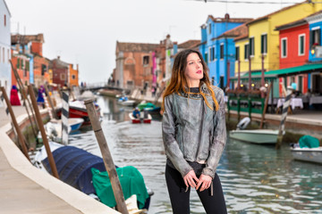 Fototapeta na wymiar Young girl smile posing Burano Venice