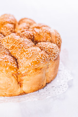 Traditional Serbian pogaca or cesnica bread covered with sesame seeds.