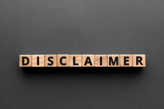 Disclaimer - words from wooden blocks with letters, denial of responsibility disclaimer concept, top view gray background