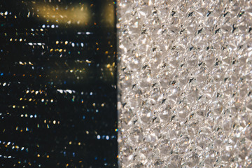 Beautiful shiny diamonds swarovski crystal background. Luxury, wealth. Cover pattern. Macro photo, close up of expensive stones.