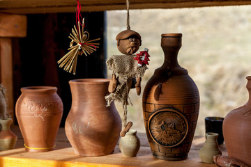 Handmade clay jugs on the counter