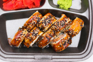 Sushi for a Japanese restaurant on a white background. Valentine's day food background top view. Holiday, celebration, food art concept. Copyspace.