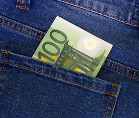 Money in the pocket of jeans. Euro currency