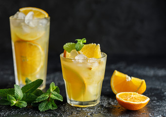 Cocktail screwdriver. Homemade orange cocktail with mint and vodka. Rum with orange juice