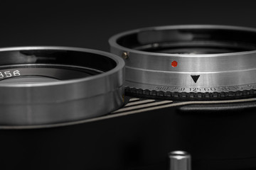 Lenses and shutter release button of vintage film camera