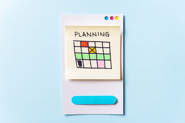 Time to planning, 2020 resolutions concept. Paper card with illustrated note on blue background with space for text.