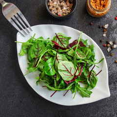 Healthy salad, leaves mix salad (mix micro greens, juicy snack). food background - copy space