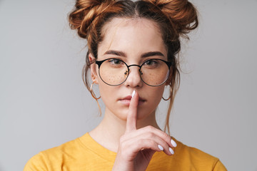 Close up of a cute young teenage girl wearing glasses