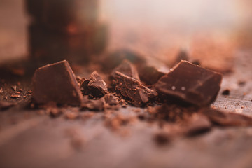 Dark chocolate on wooden table