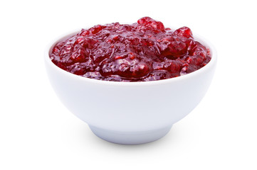 raspberry jam in white bowl isolated on white background