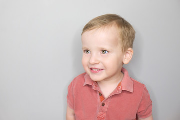 Portrait of happy joyful smiling baby boy