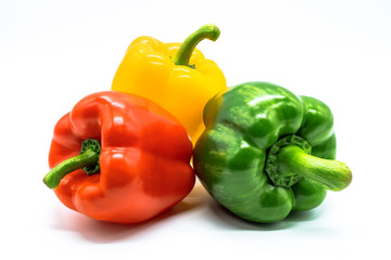 Red chilli, Green chillies, Yellow chillies, Three color bell pepper Isolated on white.