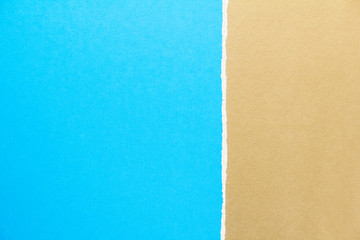 Golden brown and blue torn cardboard paper texture background. Can be used for text message.