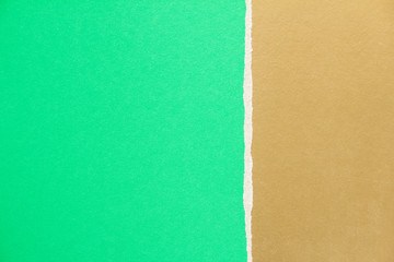 Golden brown and green torn cardboard paper texture background. Can be used for text message.