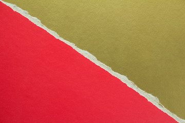 Golden and red torn sheet of cardboard paper with diagonal border texture background. Can be used...