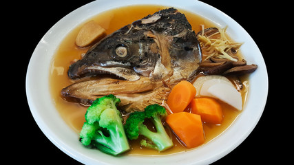 salmon fish head soup with soy sauce
