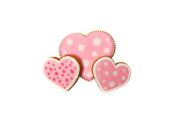 background from pink cookies heart shaped with different patterns, isolated